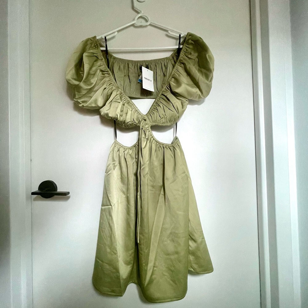 Puff sleeve silky light sage green dress with mid drift cut out